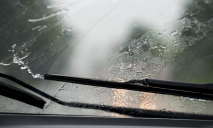 windshield wipers clearing away rain from windshield